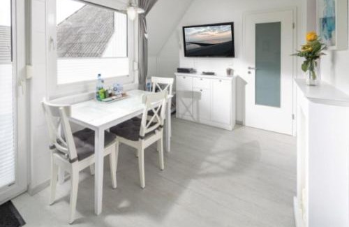 Norddeich Apartment | Inviting Skippers Cabin with Oceanfront Views and Top Ratings