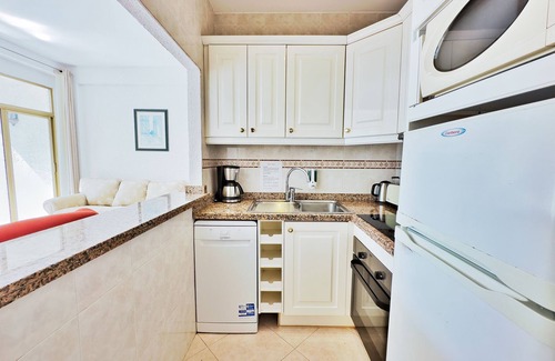 Marbella Seafront Promenade Apartment | Beachfront Skol 335: Family-Friendly Escape with Ocean Views