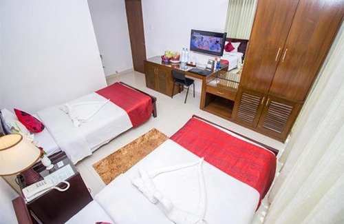 Rangpur Division Hotel | Best Kicks at SKS Inn: Eco-Friendly Retreat with Pool