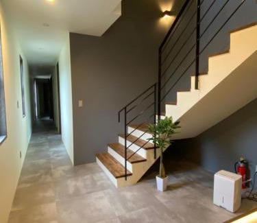 Yomitan Villa | Family-Friendly Sky Blue Villa沖縄 with Relaxing Hot Tub