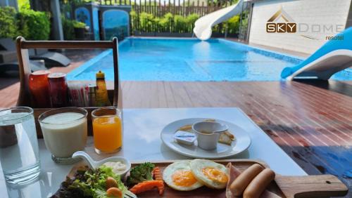 Chorakhe Bua Hotel | Oceanfront Escape at Sky Dome Resotel with Pool Access