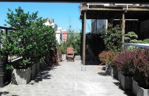 Ciudad Vieja Apartment | Sky Garden Sarandi: Pet-Friendly Pool & Barbecue Retreat