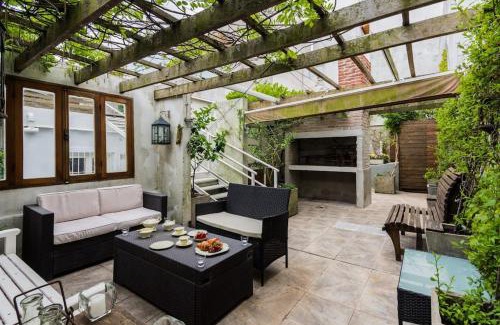 Ciudad Vieja Apartment | Sky Garden Sarandi: Poolside Relaxation & Barbecue Bliss