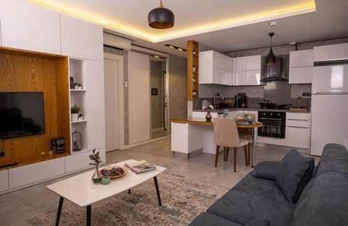 Cukurova Apartment | Sky Garden Suites: Pet-Friendly Retreat with Pool Access