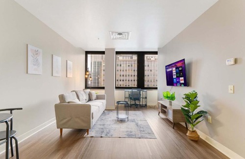 Downtown Pittsburgh Apartment | Sky High Retreat: Valet, Gym & Lounge for Ultimate Relaxation