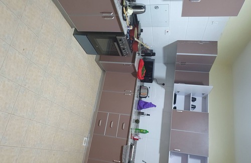 Kilimani Apartment | Sky Horse View: Ideal Family Retreat with Pool Access