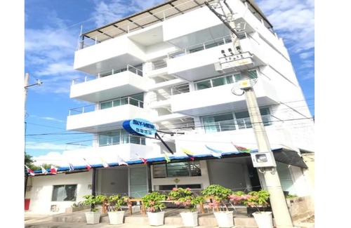 Tolu Hotel | Oceanfront Escape at Sky View Hotel Tolu with Pool Access