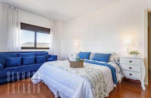 Rancho Queimado House | Sky View Mansion: Panoramic Retreat with Family-Friendly Perks