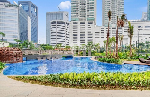 East Kuningan Apartment | Discover SKYE by Kozystay: Family-Friendly with Pool Access