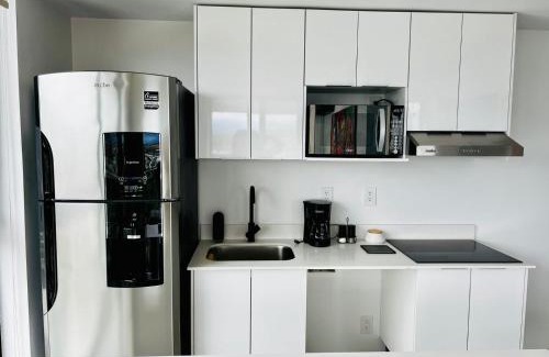 Pavas Apartment | Discover SkyGarden 18: Pet-Friendly Oasis with Ocean Views