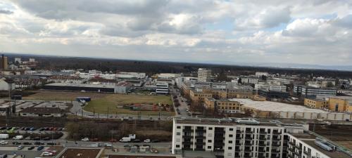 Langen Apartment | Skyline Views and Breathtaking Sunsets Await You