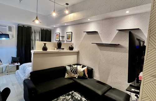 Kaunlaran Condo | Skyline City Living: Family-Friendly Comfort Awaits