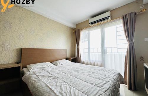 Medan Apartment | Relax at Skyview Premier Suites with Pool & Family Amenities