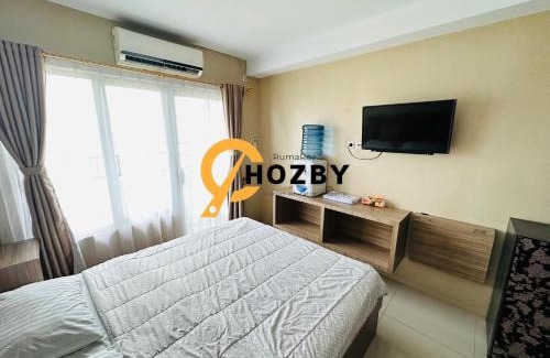 Medan Apartment | Relax at Skyview Premier Suites with Pool & Family Amenities
