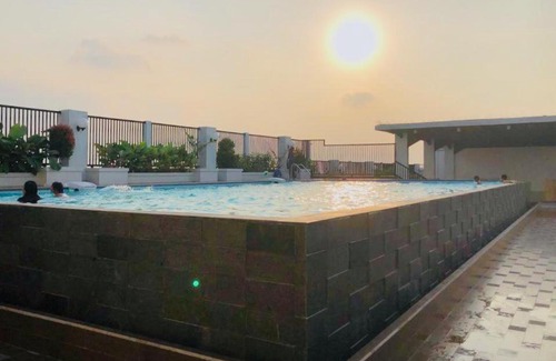 Medan Apartment | Relax at Skyview Premier Suites with Pool & Family Amenities