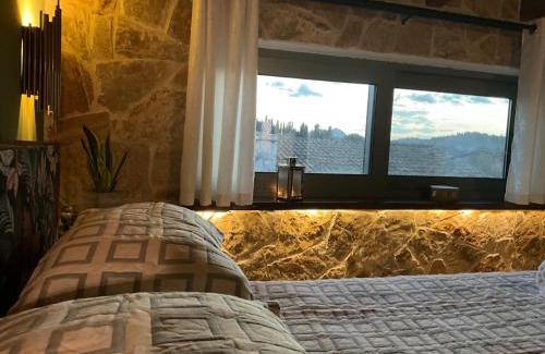 Alepou Apartment | Skyview Suite: Pet-Friendly Retreat with a Relaxing Hot Tub
