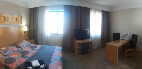 Guarulhos City Centre Apartment | Experience Slaviero1011: Oceanfront Bliss with Pool Access