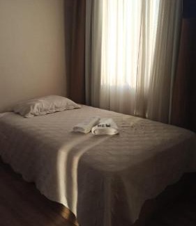 Guarulhos City Centre Apartment | Experience Slaviero1808: Oceanfront Retreat with Pool