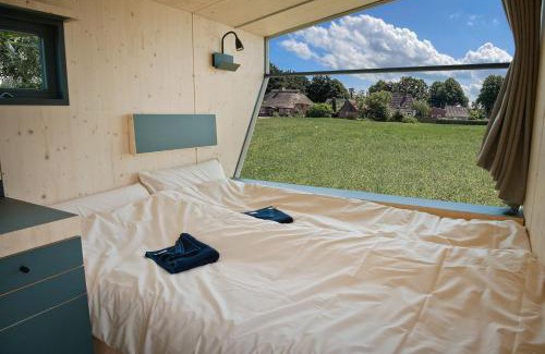 Steinbergkirche House | Discover Sleep Space 01: Family-Friendly Green Retreat