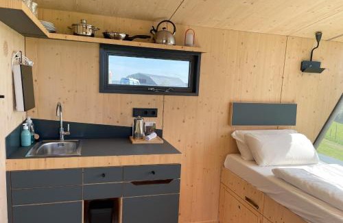 Kuhndorf House | Eco-Friendly Retreat: Sleep Space 1 - Green Tiny Spot