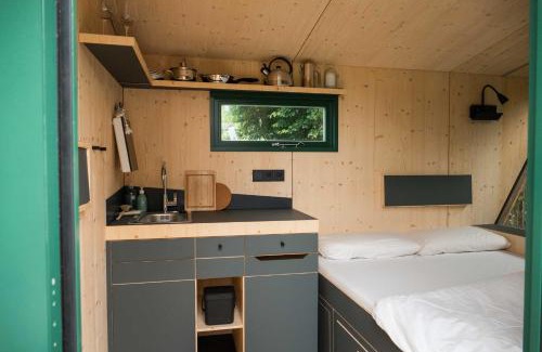 Rulzheim House | Inviting Sleep Space 3 - Family-Friendly Green Tiny Spot