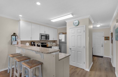 Miramar Beach Condo | Experience a Private Beach Getaway with Pet-Friendly Perks