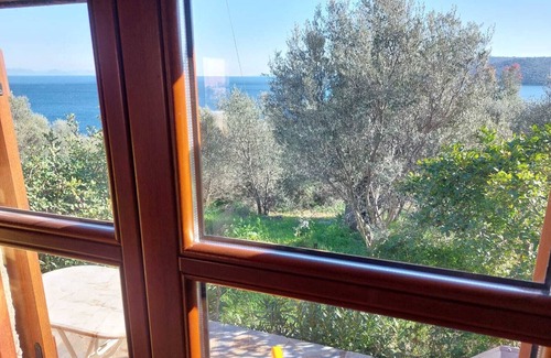 Karvelas House | Small holiday home with sea view in a quiet location near Vathy, Peloponnese.