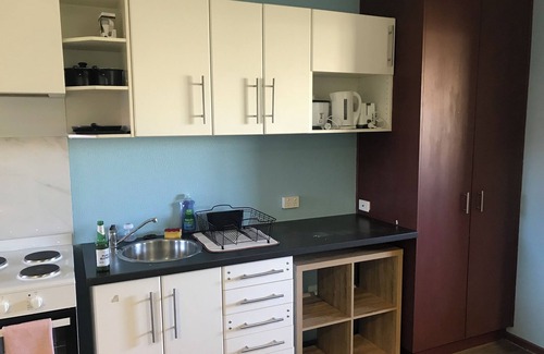 Red Cliffs Apartment | Cozy Private Retreats with Secure Accommodations