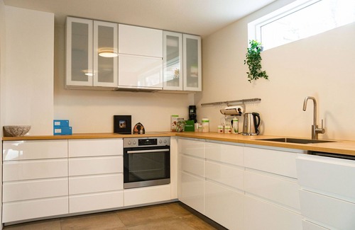 Innri-Njarthvik Apartment | Smart Luxury: Private Gym, Sauna & Hot Tub Retreat