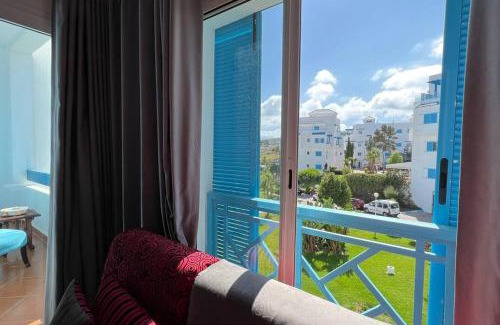 Marina Smir Apartment | Relaxing Smir Park: Gated Retreat with Pool & Family-Friendly