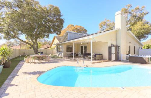 Largo House | Experience Snook Haven: Hot Tub, Pool & Mini Golf Fun
