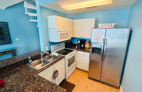 Panama City Beach Condo | Beachfront Family Condo with Pool & Spa, Steps to Pier Park