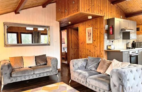 Llanybri Ski Chalet | Discover Snowdrop 9: Hot Tub Retreat in Pembrokeshire