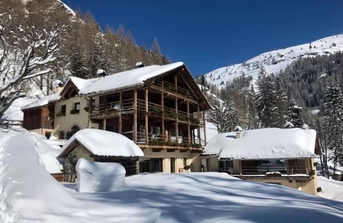 Livinallongo del Col di Lana Ski Chalet | Discover Snowflake: Dolomiti Chalet with Spa & Private Pool