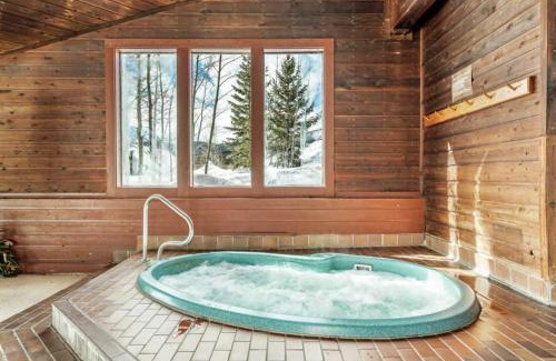Wildernest House | Cozy Snowscape 06 at Wildernest: Pool & Hot Tub Retreat