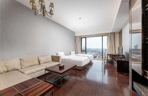 Haizhu Apartment | Family-Friendly Stay at Snug Gaokong Jiangjing Hotel