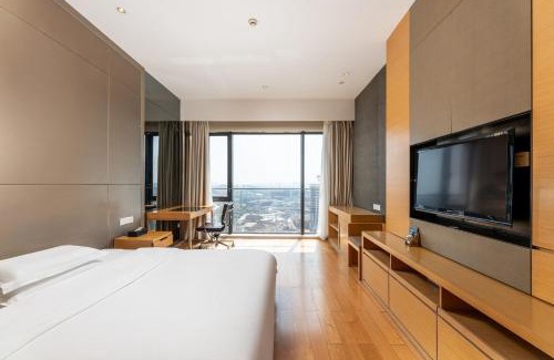 Haizhu Apartment | Family-Friendly Stay at Snug Gaokong Jiangjing Hotel
