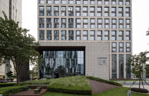 Haizhu Apartment | Family-Friendly Stay at Snug Gaokong Jiangjing Hotel