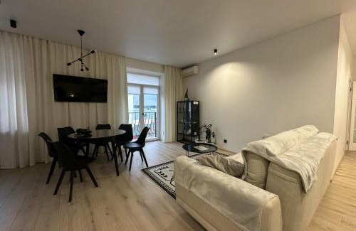 Rivne Apartment | Discover Soborna Apartment: 4-Star Retreat with Pool & Dining
