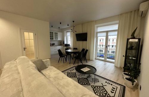 Rivne Apartment | Discover Soborna Apartment: 4-Star Retreat with Pool & Dining