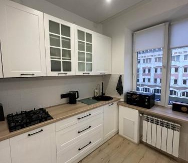 Rivne Apartment | Discover Soborna Apartment: 4-Star Retreat with Pool & Dining