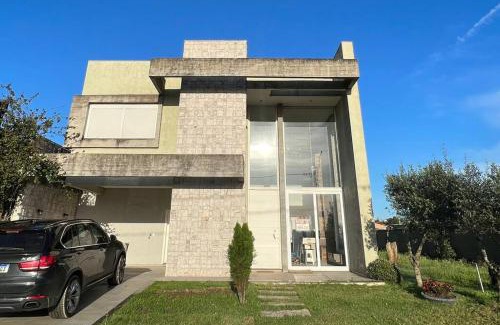 Capao da Canoa House | Discover Sobrado Araçá: Family-Friendly & Pet Welcoming Getaway