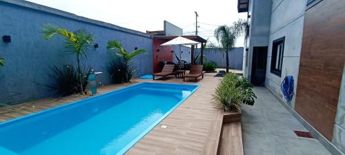 Muquem House | Family-Friendly Retreat: 3 Suites, Pool & Game Room