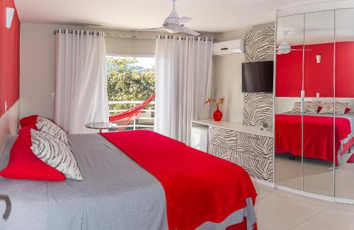 Enseada House | Inviting Retreat with Heated Pool Steps from the Beach