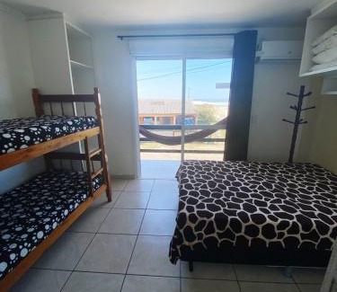 Passo de Torres Apartment | Oceanfront Bliss at Sobrados Molhes - Pet Friendly Retreat