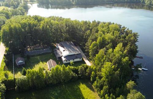 Utena county House | Discover Sodyba Ažvintis: Oceanfront Retreat with Pool
