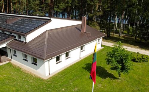 Utena county House | Discover Sodyba Ažvintis: Oceanfront Retreat with Pool