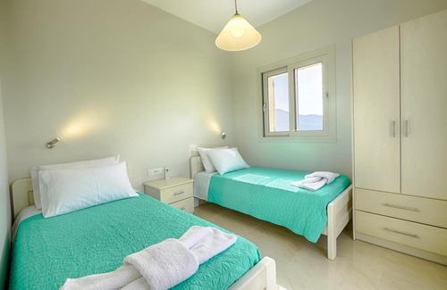 Termenades Apartment | Sofia Apartment 3 - panoramic sea view over the entire bay of Agios Georgios Pagi