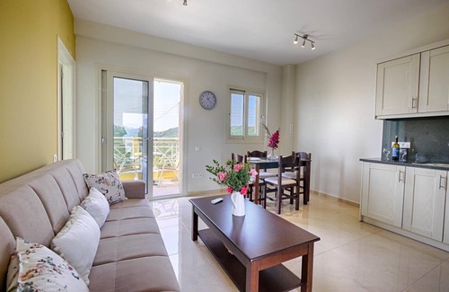 Termenades Apartment | Sofia Apartment 2 - Panoramic sea view over the entire bay of Agios Georgios Pagi