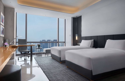 Long Hua Hotel | Elegant Sofitel Haikou: 5-Star Luxury with Pool & Spa